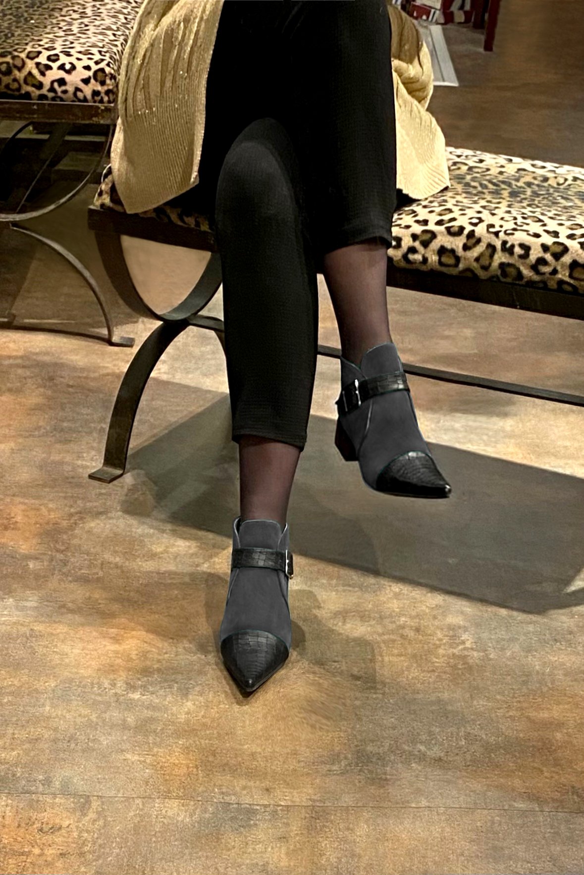 Satin black and dark grey women's ankle boots with buckles at the front. Pointed toe. Low flare heels. Worn view - Florence KOOIJMAN